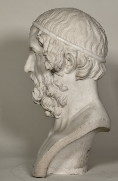 Homer. Popiersie marmurowe. Homer przedstawiony jest jako stary mężczyzna, z wychyloną do przodu głową, łysy, z zapadniętymi policzkami i ze zmarszczkami. Bok lewy