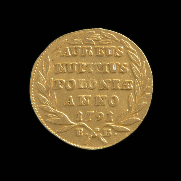 środek płatniczy, pieniądz, moneta - Ujęcie rewersu. Moneta z poziomym napisem w wieńcu laurowym na rewersie.