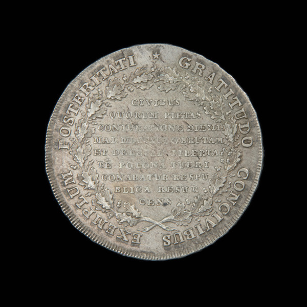 środek płatniczy, pieniądz, moneta - Ujęcie rewersu. Moneta z poziomym napisem w sześciu wersach na awersie.