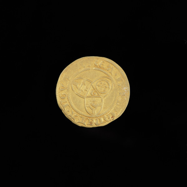 złoty gulden - Ujęcie rewersu. Moneta z tarczą herbową na krzyżu na awersie i trzema małymi tarczami herbowymi na rewersie. Na rewersie: trzy tarcze herbowe ułożone w trójliść, napis w otoku.