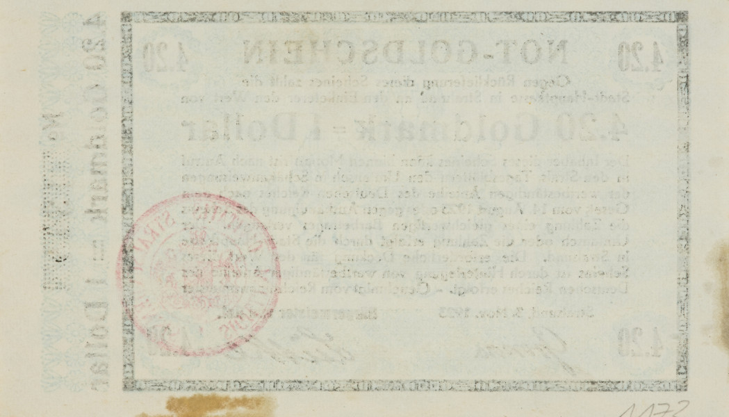 bon - Ujęcie strony odwrotnej. Jednostronny bon o nominałe 4,20 złotej marki = 1 dolar, z błękitnym poddrukiem, czarnymi napisami i bordową pieczęcią.