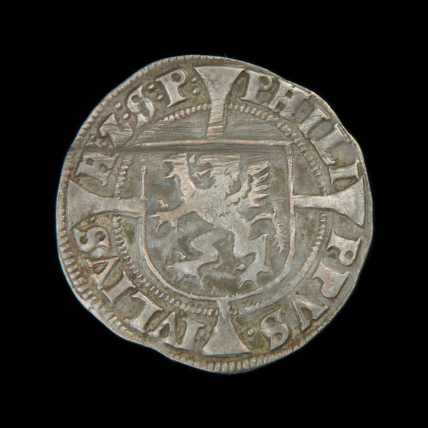 1/16 talara - Ujęcie awersu. Na awersie gryf wspięty w lewo na tarczy herbowej umieszczonej na długim krzyżu. W otoku napis przedzielony ramionami krzyża.