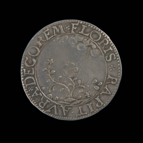 1/8 talara - Ujęcie awersu. Na awersie w liniowej obwódce kwiat na łące smagany wiatrem. W otoku napis przedzielony rozetkami i otoczony perełkami.