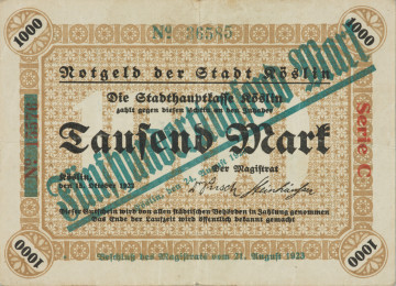 bon - Ujęcie strony głównej. Dwustronny bon o nominałe 1000 marek, z brązowym poddrukiem, czarnymi gotyckimi napisami i ciemno-zielonym nadrukiem nominału 500 000 marek.