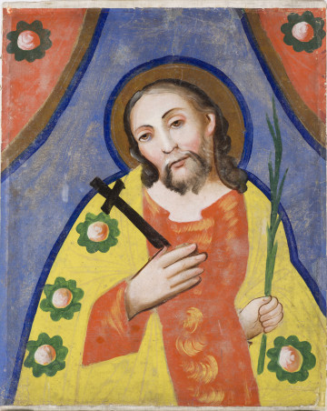 Obraz na papierze wykonany farbami klejowymi, przedstawiający popiersie Jezusa na niebieskim tle. W górnych rogach czerwone kotary o brązowym brzegu i grubych granatowych konturach, z kwiatami o ciemnozielonych płatkach. Sama postać obrysowana grubymi granatowymi konturami. Głowa Jezusa lekko pochylona na lewo. Rysy twarzy zaznaczone bardzo cienkim pędzelkiem, prawie suchym. Szata czerwona, na piersi wycięta, zdobiona ornamentem w postaci żółtych plam. Płaszcz żółty zdobiony zielonymi kwiatami, o czerwono-białych środkach. Ręce zaznaczone konturami brązowymi, place grube. W prawej ręce trzyma czarny krzyżyk, w lewej palmę.  