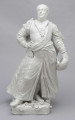S/CS/657/ML - Figura z białej porcelany przedstawia króla Augusta III en pied na cokole zdobionym plastycznie modelowanymi różami i goździkami. Król stoi w kontrapoście, z lekko uniesioną głową, prawą rękę opiera na biodrze, w lewej opuszczonej trzyma czapkę okrągłą obszytą futrem. Ubrany jest w polski strój szlachecki: żupan, kontusz z zarzuconymi wylotami i pas. Na piersi ma order Złotego Runa i wstęgę z krzyżem orderu Orła Białego, przy lewym boku szablę na ozdobnych rapciach.
Figura stanowi wierne odwzorowanie portretu króla wykonanego przez Louis de Silvestre'a nadwornego malarza ok. roku 1737 (obecnie w zbiorach Muzeum w Wilanowie).