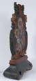 E/16801/ML - Feretron drewniany polichromowany. Z kręgu sztuki prawosławnej. W obramieniu trójlistnym ze stylizowanymi liśćmi akantu, przedstawia Matkę Bożą Chełmską i Św. Mikołaja. 
Madonna z Dzieciątkiem: w niebieskiej szacie ze złotym wykończeniem przy szyi, czerwonym płaszczu, złotej koronie. Na prawym ramieniu trzyma Dzieciątko, w biało-szarej szacie i złotej koronie. Wzrok postaci skierowane ku sobie. Wokół głów – złote nimby. Karnacja cielisto-brązowa. Tło ciemnobrązowe. Po obu stronach głów postaci litery.
Św. Mikołaj: postać stojąca w czerwono-niebieskiej szacie ze złotymi lamowaniami. W lewej, zgiętej w łokciu ręce – księga, brązowa ze złotymi kartami. Prawa ręka zgięta i uniesiona w geście błogosławieństwa; pod nią torba. Na szyi – łańcuch z krzyżem. Na głowie biskupia korona, a wokół niej złoty nimb. Po obu stronach postaci, na wysokości ramion, napisy w j. greckim. W tle pejzaż ze wzniesieniem i roślinnością, a po lewej stronie przedstawienia – cerkiew. 
Kolory obramienia feretronu: ceglasty, czerwony, granatowy, ciemnozielony. 

Konserwacja: 1999-2000