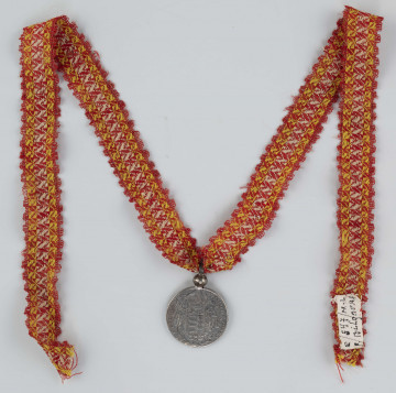 E/697/ML - Talar z czasów Marii Teresy, z wybitą datą 1779 r. Wykonany z metalu. Noszony na szyi przez kobiety jako ozdoba.