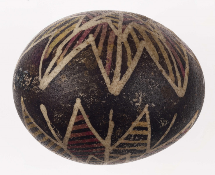 E/1329/ML - Technika batik. Motyw gwiazdy. Barwa tła brązowa, barwa motywu biała, żółta i różowa.