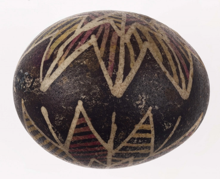 E/1329/ML - Technika batik. Motyw gwiazdy. Barwa tła brązowa, barwa motywu biała, żółta i różowa.