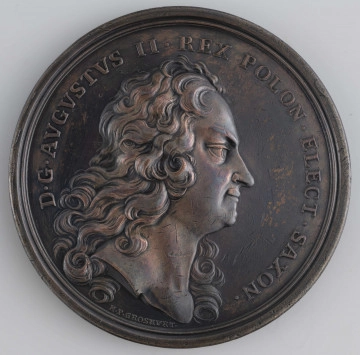 N/1550/ML - AV. Głowa króla w profilu w prawo. W otoku napis rozdzielony na dole przez wizerunek:
D . G . AVGVSTVS II . REX POLON . ELECT . SAXON . 
U dołu sygnatura: H . P . GROSKVRT .

RV. Z prawej Merkury siedzący na murze wręcza sakiewkę amorkowi trzymającemu w prawej ręce rysunek budynku. W tle zabudowania. Na górze w otoku napis:
PRAEMIA . AEDIFICANTIBVS . CONSTITVTA . 
Na dole w odcinku napis:
EX . AERARIO . OPT . PRINC . / MDCCVII
