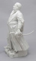 S/CS/657/ML - Figura z białej porcelany przedstawia króla Augusta III en pied na cokole zdobionym plastycznie modelowanymi różami i goździkami. Król stoi w kontrapoście, z lekko uniesioną głową, prawą rękę opiera na biodrze, w lewej opuszczonej trzyma czapkę okrągłą obszytą futrem. Ubrany jest w polski strój szlachecki: żupan, kontusz z zarzuconymi wylotami i pas. Na piersi ma order Złotego Runa i wstęgę z krzyżem orderu Orła Białego, przy lewym boku szablę na ozdobnych rapciach.
Figura stanowi wierne odwzorowanie portretu króla wykonanego przez Louis de Silvestre'a nadwornego malarza ok. roku 1737 (obecnie w zbiorach Muzeum w Wilanowie).
