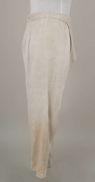 E/17371/ML - Spodnie lniane, szyte maszynowo. Pasek szer. 3,5 cm, dł. 96 cm, dł. rozporka 15 cm. Zapinane na guzik. 