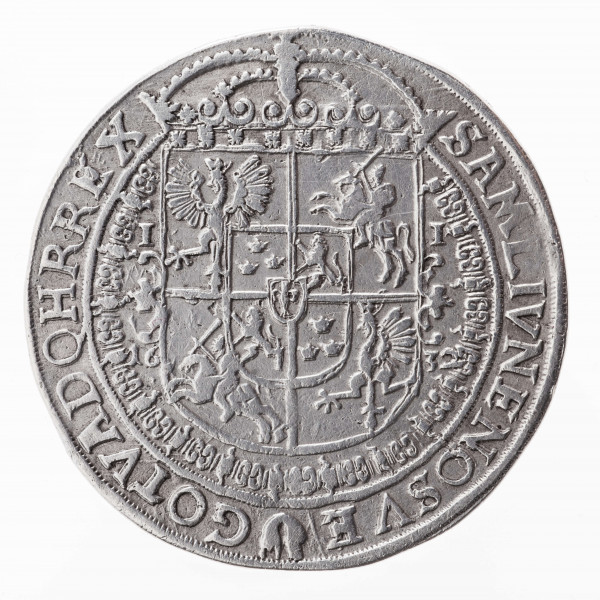 Aw. W tondzie ujętym pojedynczym otokiem liniowym ukoronowana półpostać króla w zbroi w profilu w prawo. Spod zbroi widoczna jest kryza. Władca w prawej ręce trzyma miecz skierowany ostrzem do góry, a w lewej  jabłko królewskie. Legenda dookolna rozdzielona u góry koroną monarchy, u dołu małą tarczą z herbem Półkozic – Hermolausa Ligęzy podskarbiego wielkiego koronnego (1624–1632): + SIGIS+III.D:G+REX.POLO:M.D LIT+PRVS:MAS +

Rewers. W pojedynczym nieliniowym otoku  ukoronowana dziewięciodzielna tarcza z herbami Polski, Litwy, Szwecji, Gotlandii oraz Wazów w centralnym polu. Tarcza ujęta łańcuchem z odznaką orderową orderu Złotego Runa, która rozdziela na dole legendę dookolną:
SAM+LIV.NEC+NO.SVE – GOT+VAND:Q+HRI.REX x
Tarcza rozdziela datę 16 – 32

