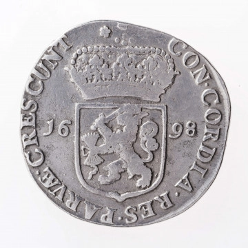 Aw. Postać rycerza w zbroi, głową zwrócona w prawo, z przyłbicą  z podniesioną zasłoną. Rycerz w prawej dłoni trzyma miecz ostrzem skierowany do góry, a w lewej na wstędze tarczę z herbem prowincji Zelandia. Legenda dookolna rozdzielona na górze wizerunkiem, poprzedzona znakiem menniczym:
MO.NO.ARG.PRO.CONFOE.BELG.COM.ZEEL
Dwie ostatnie litery w członie CONFOE oddane w formie ligatury. 

Rw. Ukoronowana tarcza z herbem Republiki Zjednoczonych Prowincji dzieląca datę 16 – 98, umieszczoną na osi poziomej. Legenda dookolna:
CON.CORDIA.RES.PARVAE.CRESCUUNT
Ostatnie dwie litery w wyrazie PARVAE oddane w formie ligatury. 