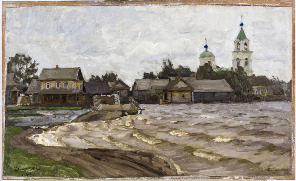 Na pierwszym planie wzburzone jezioro zalewające brzeg ze znajdującym się tu pomostem. W głębi, wzdłuż linii horyzontu widoczne są domy i drzewa, a z prawej strony biała bryła kościoła ze strzelistą wieżą i kopułą.