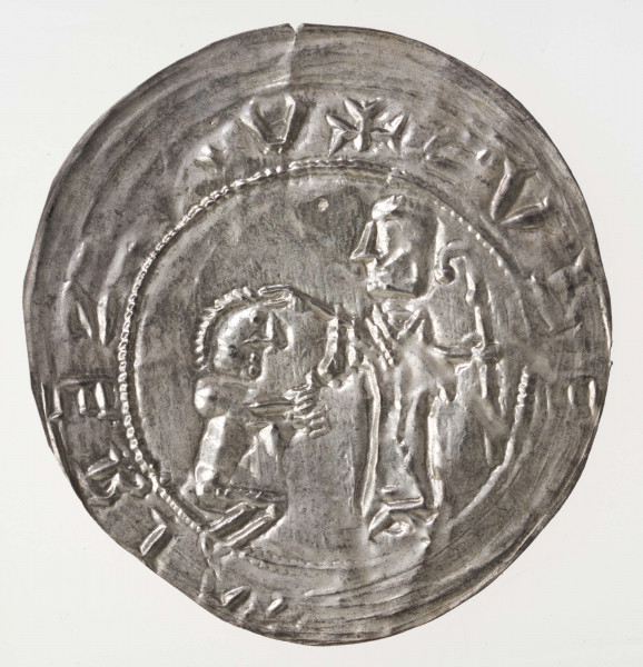 W otoku klęczący książę, przed nim z pastorałem św. Wojciech kładący rękę na głowie władcy. Legenda otokowa zniekształcona poprzedzona krzyżykiem inicjalnym, rozpoczynająca się najprawdopodobniej od: BEZ[LA]V )( IA[ZIRB]ELVC
Część liter jest odwrócona.