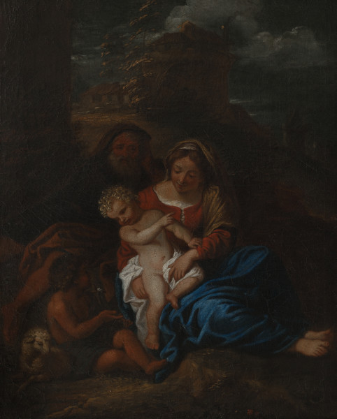 Lico obrazu. Biblijna scena przedstawiająca siedzącą Matkę Boską, ubraną w czerwona suknię, okrytą na kolanach błękitnym płaszczem, na którym trzyma nagiego Jezuska. U jej stóp siedzi bawiący się z barankiem Św. Jan. Za plecami Matki Boskiej, w półcieniu, ubrany w ciemną opończę przygląda się rodzinnej zabawie brodaty Św. Józef. Punktowe oświetlenie wyłania kolejno żywo gestykulującego Jezuska, a następnie starającą się go przytrzymać, rozbawioną Matkę Boską. 