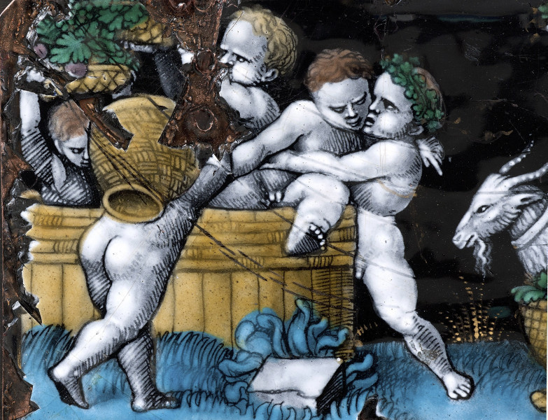 lewa strona plakiety z przedstawieniem Puttów wokół kadzi, po prawej głowa kozła.