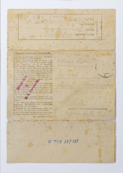 List obozowy napisany w j. niemieckim przez Zenona Waśniewskiego więźnia obozu KL Auschwitz, list napisany do żony Michaliny, 2 strony, pismo od lewej do prawej.