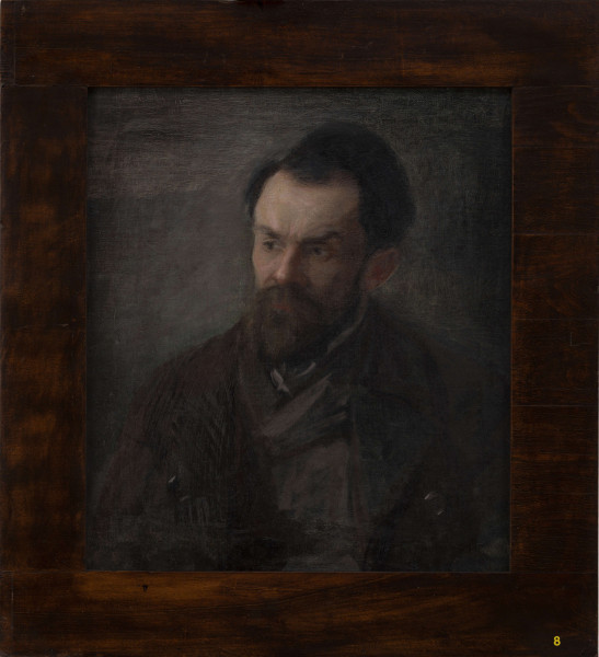 Stefan Żeromski z wąsami i brodą z wzrokiem skierowanym w lewą stronę. Ubrany w płaszcz i marynarkę. Całość utrzymana w szaro-brązowej tonacji.