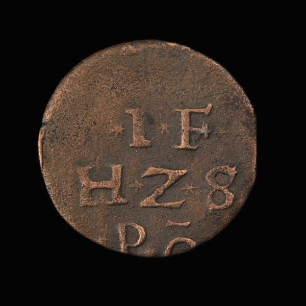 Szerf - awers; Miedziana moneta księcia Jana Fryderyka z napisem i gryfem. Na awersie napis w trzech wierszach ⁎I⁎F | H⁎Z⁎S | P⁎ō (Jan Fryderyk, książę szczecińsko-pomorski).