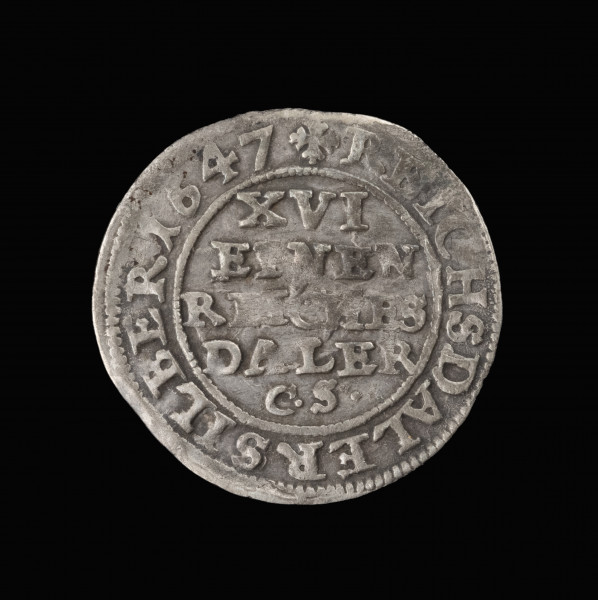 1/16 talara - rewers; Moneta srebrna ze strzałą i napisem strefowym. Na rewersie w polu napis w pięciu wierszach: XVI | EINEN | REICHEN | DALER | C.S. W otoku napis: REICHSTHALER SILBER 1647 (srebrny talar Rzeszy).