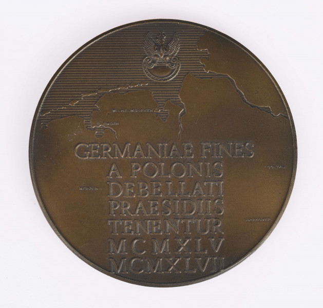 H/2448/MRK/ML - Medal pamiątkowy bity w brązie średnicy 7 cm, na awersie napis 1. Dywizja Pancerna i Odznaka rospoznawcza Dywizji.
