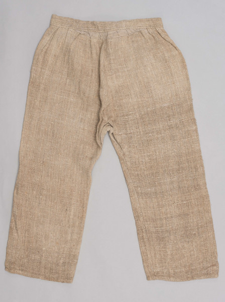 E/478/MRK/ML - Kalesony uszyte z lnianego płótna o nieregularnym splocie, krój prosty, w pasie wszyta oszewka o szerokości 3 cm, szwy tzw. 