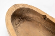E/13/MRK/ML - Drewniaki dłubane, para. Długość 31 cm. Zrobione z dwóch kawałków drewna zbitych gwoździami. Z boku otwory do wiązania.
