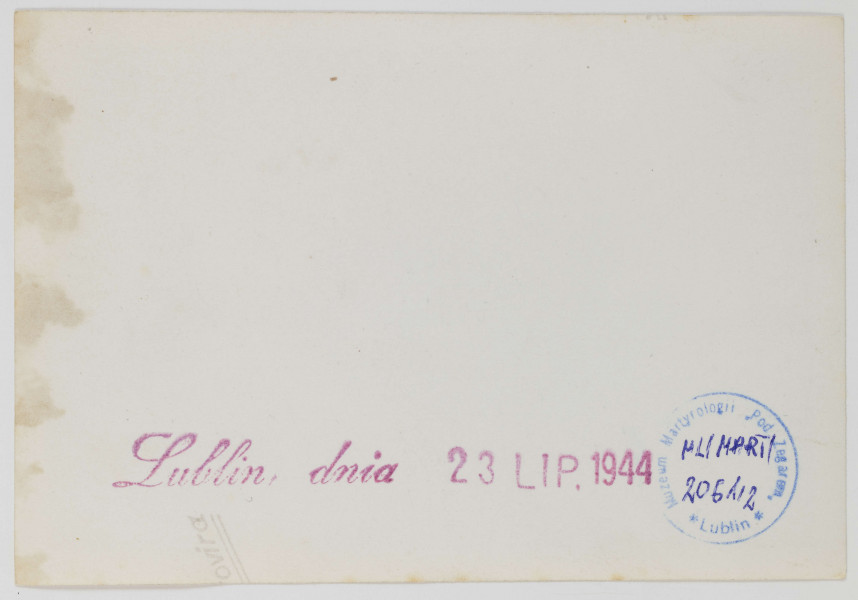 Fotografia - fotokopia Krakowskiego Przedmieścia (w kierunku Placu Litewskiego) zimą z czasów okupacji wykonana ze zdjęcia oryginalnego, opatrzona pieczątką `Lublin, dnia 23 LIP 1944`.