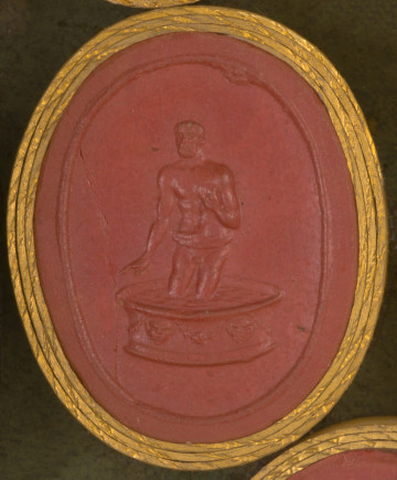 czerwona gemma, owalna pionowa, w grubym złotym obramowaniu. Nagi mężczyzna zanurzony do kolan w okrągłej, zdobionej wannie z wodą. Mężczyzna o krótkich włosach, wąsach i krótkiej brodzie; lewa dłoń na piersi, prawa ręka opuszczona wzdłuż tułowia. 