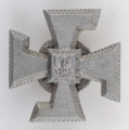 ML/MART/4223 - Odznaka 4. Pułku Piechoty Legionów (prawoskrętna swastyka z kwadratową tarczą z orłem bez korony pośrodku, wz. z 1916 r., należąca do gen. Smorawińskiego.