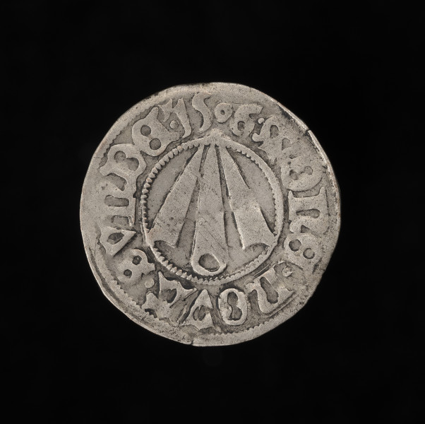 szeląg - awers; moneta srebrna; Na awersie grot strzały. W perełkowym otoku napis: MONE NOVA SVNDE 1506 (moneta nowa sundzka).