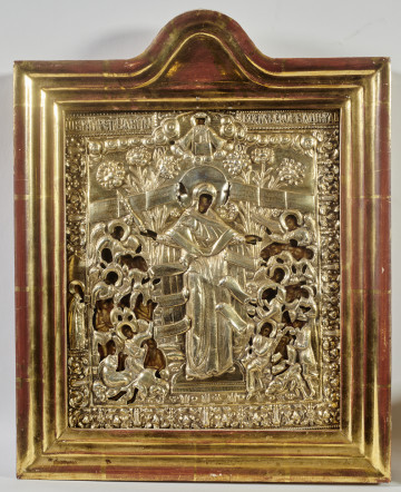 ikona w okładzie srebrnym złoconym, z wizerunkiem Bogurodzicy Radość Strapionych w całej postaci, z berłem w prawicy, stojącej wśród zwróconych do niej postaci, z towarzyszącymi aniołami, w zwieńczeniu półpostać Chrystusa Pantokratora; na lewym pasie bordiury św. Bazyli Męczennik 